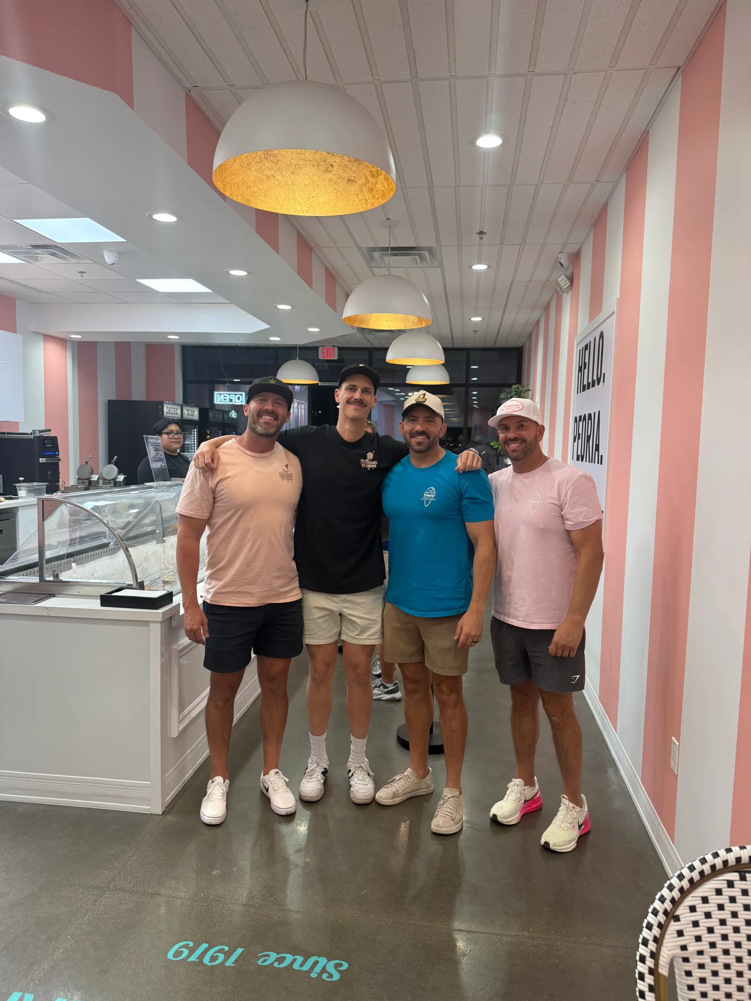 The four current owners of Petersen's Ice Cream at the Peoria shop.